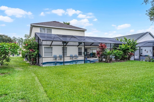 909 Troon Cir, Davenport, FL 33897 - back of house with stucco siding, a patio area, a lawn, and an outdoor pool