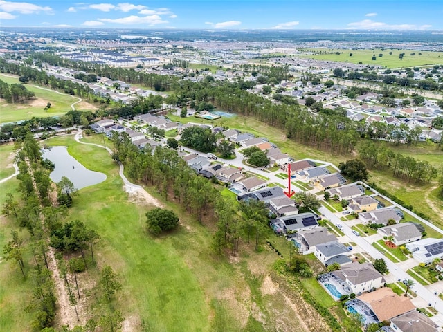 909 Troon Cir, Davenport, FL 33897 - aerial view of property and surrounding area with nearby suburban area and a nearby body of water
