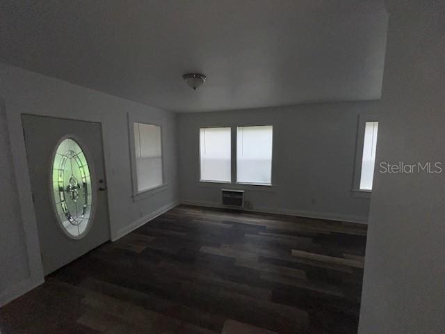 3029 Azalea Ave, Lake Wales, FL 33898 - entrance foyer with wood finished floors and an AC wall unit