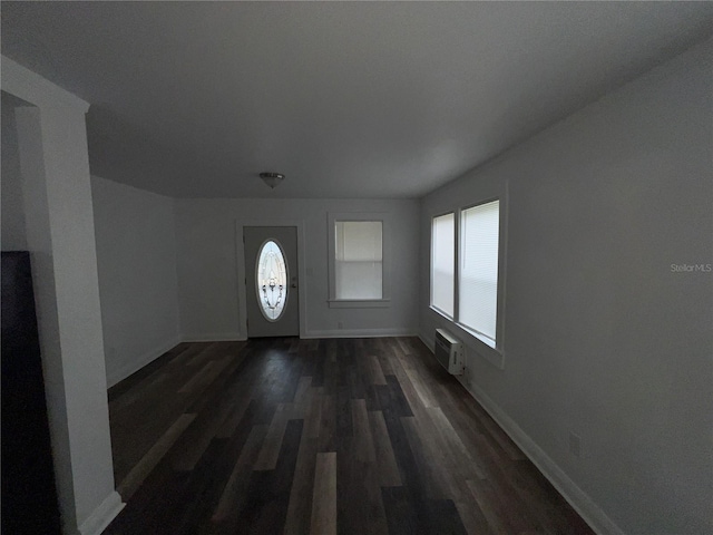 3029 Azalea Ave, Lake Wales, FL 33898 - foyer entrance with baseboards and dark wood finished floors