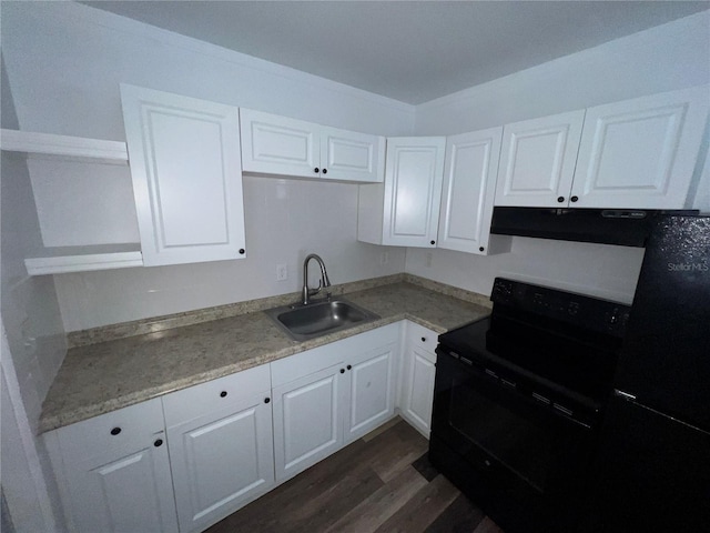 3029 Azalea Ave, Lake Wales, FL 33898 - kitchen with black appliances, dark wood-style floors, white cabinetry, and range hood