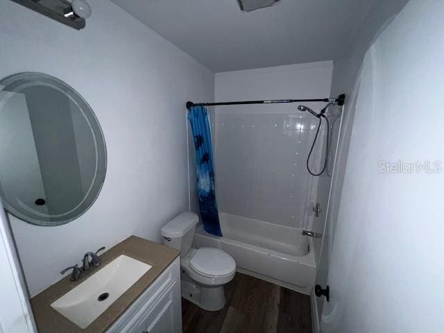 3029 Azalea Ave, Lake Wales, FL 33898 - bathroom with wood finished floors, shower / bathtub combination with curtain, and vanity