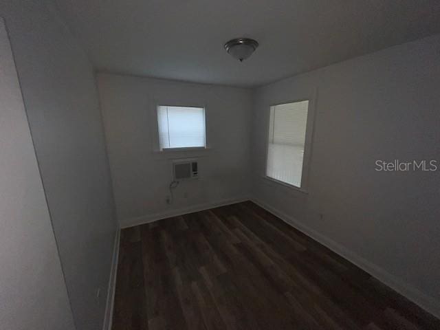 3029 Azalea Ave, Lake Wales, FL 33898 - unfurnished room featuring dark wood-type flooring and baseboards