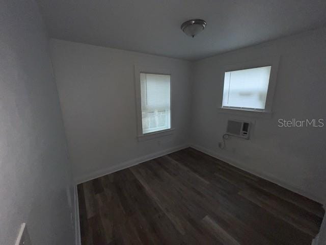 3029 Azalea Ave, Lake Wales, FL 33898 - empty room featuring dark wood-style floors and baseboards