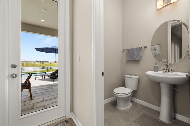 5133 Citrus Leaf Blvd, Winter Garden, FL 34787 - half bath featuring toilet and baseboards