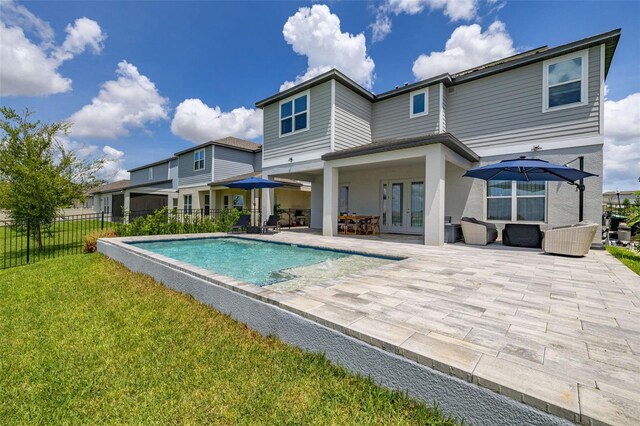 5133 Citrus Leaf Blvd, Winter Garden, FL 34787 - back of house featuring french doors and a patio area