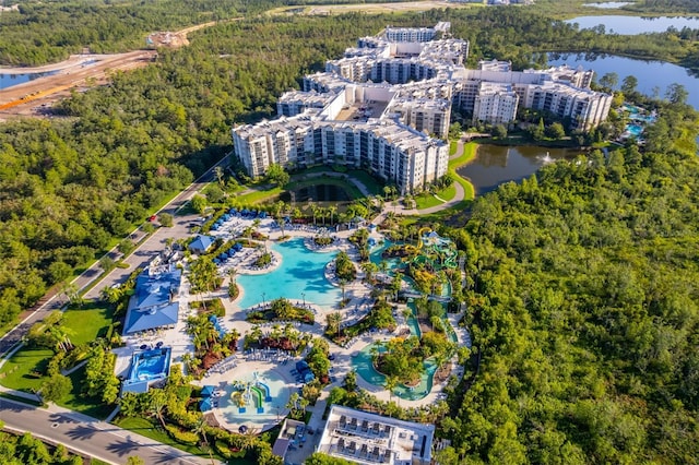 14501 Grove Resort Ave Unit 2534, Winter Garden, FL 34787 - view of property location featuring a heavily wooded area and a nearby body of water