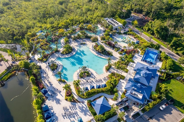 14501 Grove Resort Ave Unit 2534, Winter Garden, FL 34787 - aerial overview of property's location featuring a pool area and a forest