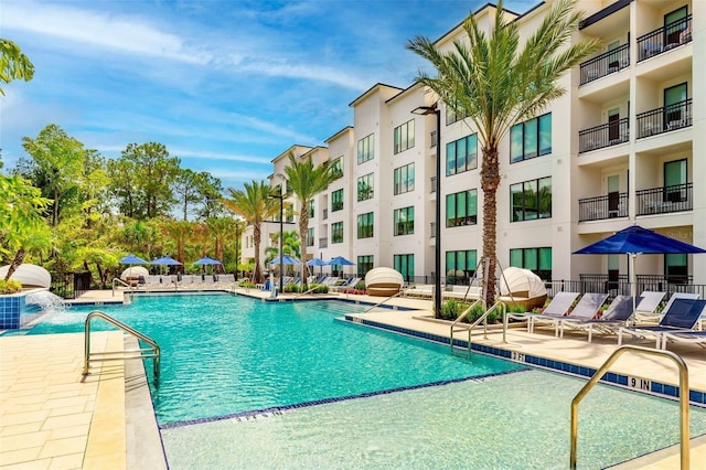14501 Grove Resort Ave Unit 2534, Winter Garden, FL 34787 - community pool with a patio area