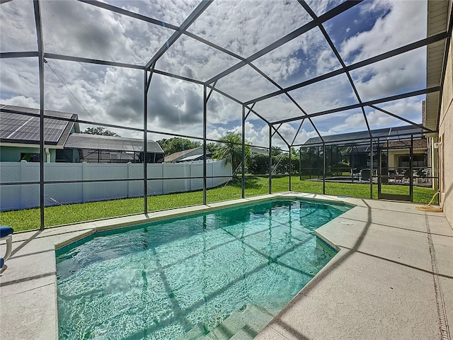2649 Hemingway Ave, Haines City, FL 33844 - view of swimming pool with a patio area, a fenced backyard, and glass enclosure