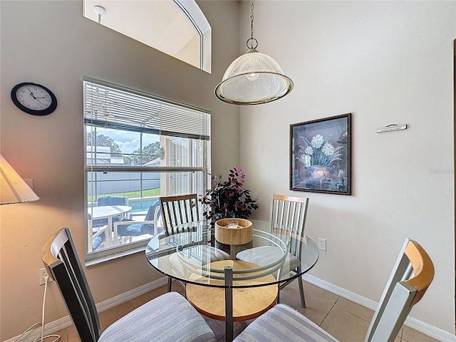 2649 Hemingway Ave, Haines City, FL 33844 - dining room featuring baseboards and light tile patterned floors