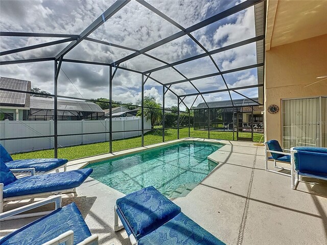 2649 Hemingway Ave, Haines City, FL 33844 - view of pool featuring a patio area, a fenced backyard, and a lanai