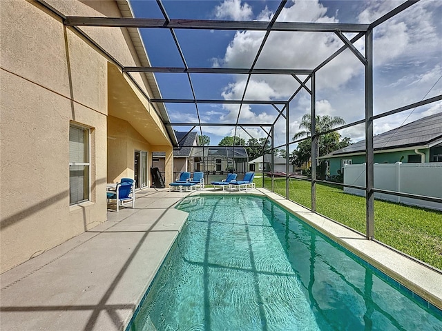 2649 Hemingway Ave, Haines City, FL 33844 - swimming pool with a patio, a lawn, and glass enclosure