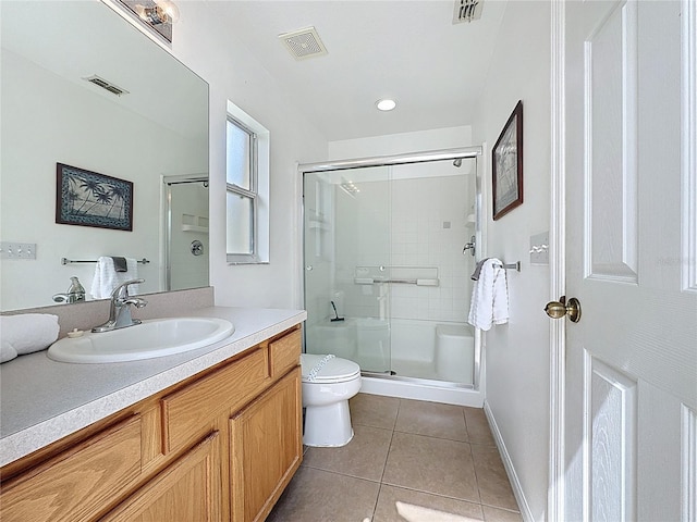 2649 Hemingway Ave, Haines City, FL 33844 - bathroom featuring tile patterned flooring, a stall shower, vanity, and recessed lighting