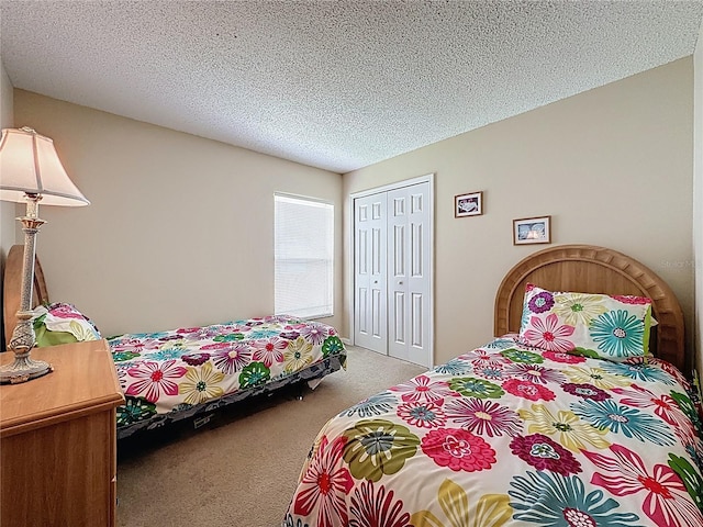 2649 Hemingway Ave, Haines City, FL 33844 - carpeted bedroom with a closet and a textured ceiling