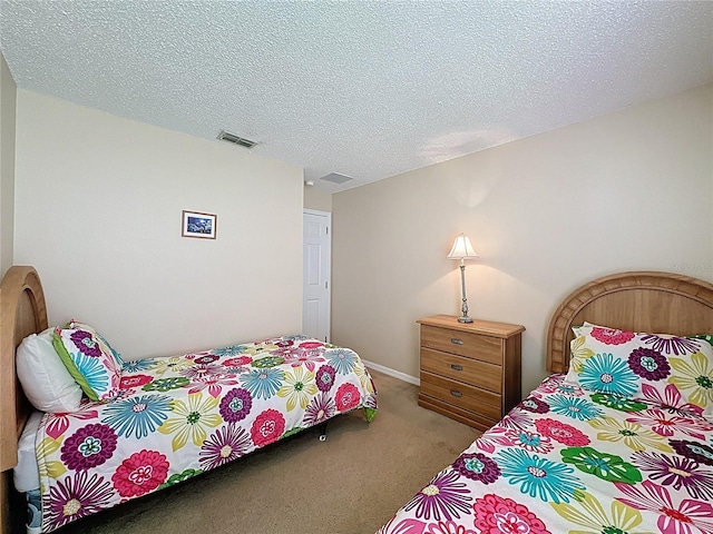 2649 Hemingway Ave, Haines City, FL 33844 - bedroom with carpet flooring and a textured ceiling