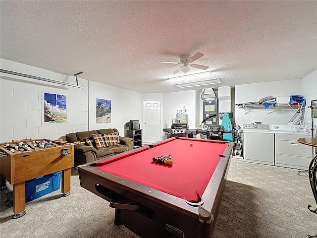 2649 Hemingway Ave, Haines City, FL 33844 - recreation room featuring washer and clothes dryer, carpet, concrete block wall, a ceiling fan, and a textured ceiling