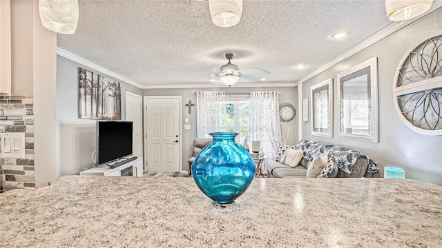 505 Oak Dr, Tavares, FL 32778 - living area featuring crown molding, a textured ceiling, and ceiling fan