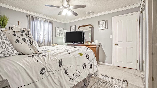 505 Oak Dr, Tavares, FL 32778 - carpeted bedroom with a textured ceiling, ornamental molding, and a ceiling fan