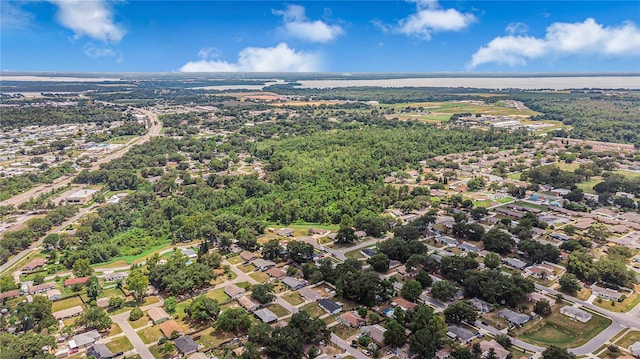 505 Oak Dr, Tavares, FL 32778 - aerial overview of property's location with nearby suburban area