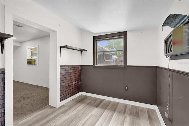 1501 Missouri Ave, Saint Cloud, FL 34769 - empty room featuring light wood finished floors and cooling unit