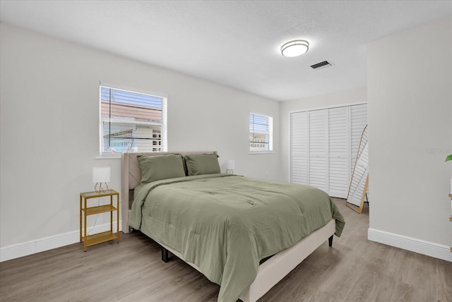 1501 Missouri Ave, Saint Cloud, FL 34769 - bedroom with wood finished floors and a closet