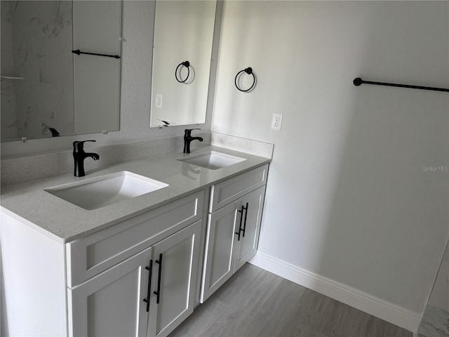 21 Pine Course Trak, Ocala, FL 34472 - bathroom featuring double vanity and wood finished floors
