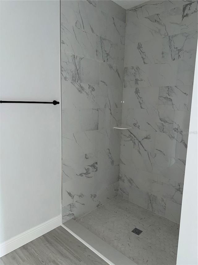 21 Pine Course Trak, Ocala, FL 34472 - bathroom featuring a marble finish shower and wood finished floors