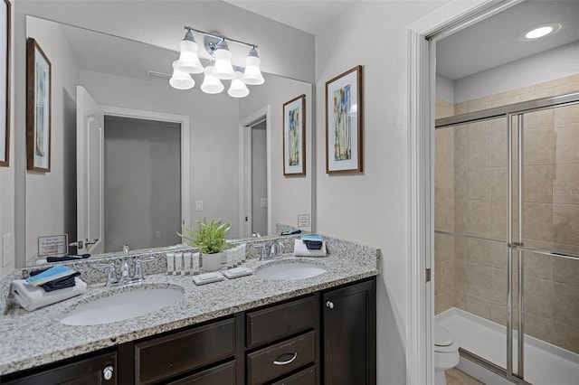 8897 Rhodes St, Kissimmee, FL 34747 - full bath featuring double vanity, a stall shower, and a chandelier