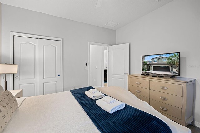 8897 Rhodes St, Kissimmee, FL 34747 - bedroom featuring a closet and ceiling fan