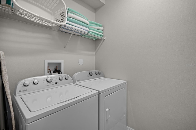 8897 Rhodes St, Kissimmee, FL 34747 - washroom with independent washer and dryer