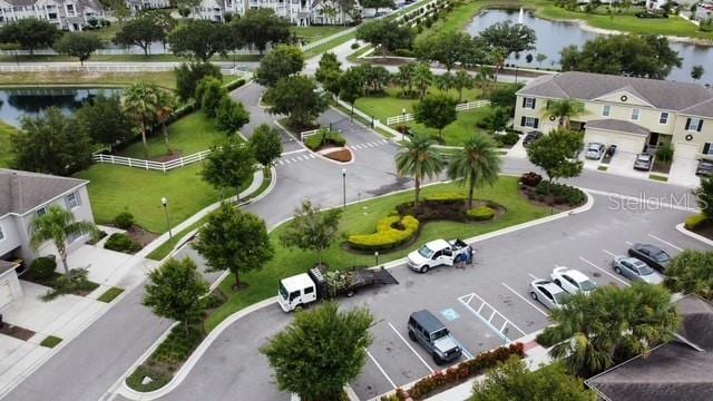 403 Arbor Lakes Dr, Davenport, FL 33896 - aerial perspective of suburban area with a large body of water