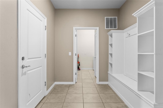 2161 Lelani Cir, Davenport, FL 33897 - mudroom with light tile patterned floors and baseboards