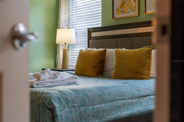 2161 Lelani Cir, Davenport, FL 33897 - bedroom featuring multiple windows