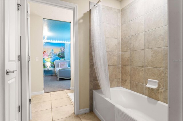 2161 Lelani Cir, Davenport, FL 33897 - ensuite bathroom featuring shower / tub combo and tile patterned floors