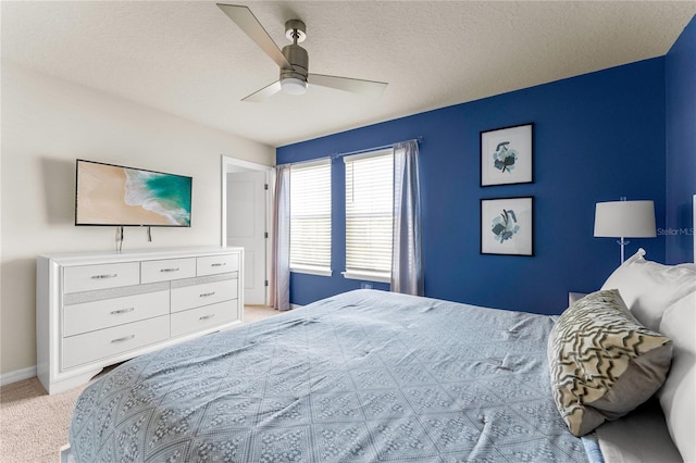 2161 Lelani Cir, Davenport, FL 33897 - bedroom featuring light colored carpet, a ceiling fan, and a textured ceiling