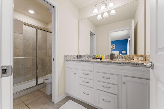 2161 Lelani Cir, Davenport, FL 33897 - bathroom featuring double vanity, a stall shower, and tile patterned floors