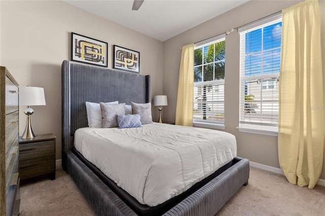 2161 Lelani Cir, Davenport, FL 33897 - bedroom featuring light colored carpet and a ceiling fan