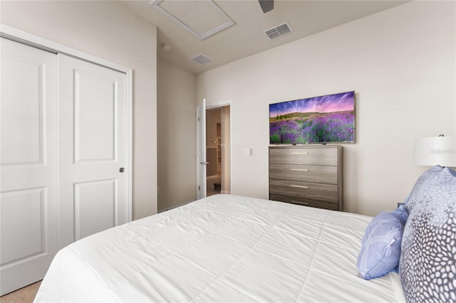 2161 Lelani Cir, Davenport, FL 33897 - bedroom with attic access, a closet, and a ceiling fan