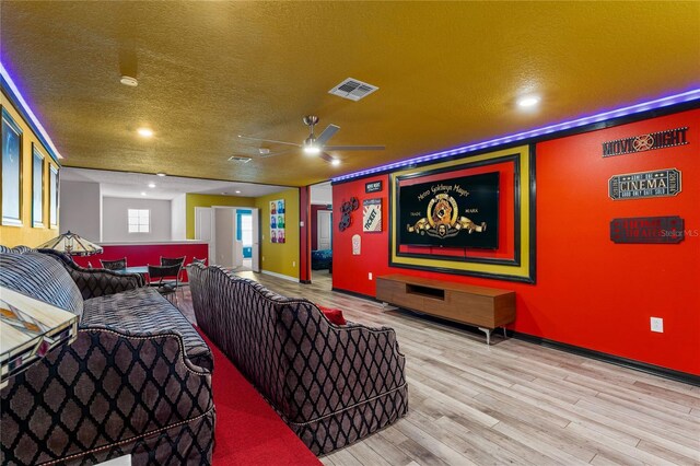 2161 Lelani Cir, Davenport, FL 33897 - home theater with wood finished floors, a textured ceiling, and recessed lighting