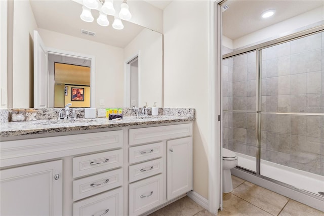2161 Lelani Cir, Davenport, FL 33897 - bathroom featuring tile patterned flooring, double vanity, and a shower stall