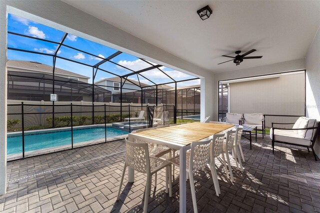 2161 Lelani Cir, Davenport, FL 33897 - view of patio / terrace with a ceiling fan, a pool with connected hot tub, and a lanai