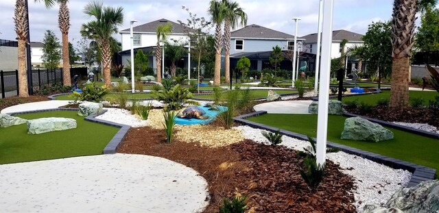 2161 Lelani Cir, Davenport, FL 33897 - view of property's community with a putting green and a residential view