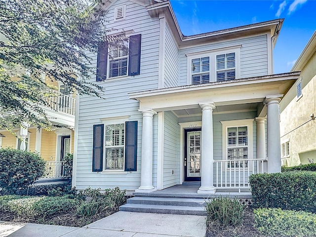 1513 Resolute St, Celebration, FL 34747 - view of front of home with a porch