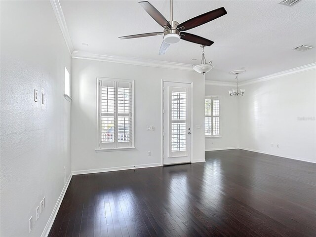 1513 Resolute St, Celebration, FL 34747 - unfurnished room with a ceiling fan, dark wood-style flooring, a chandelier, and ornamental molding