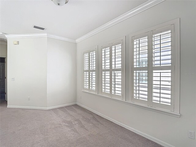 1513 Resolute St, Celebration, FL 34747 - carpeted empty room with ornamental molding and plenty of natural light