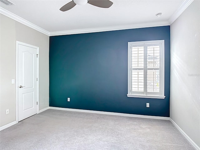 1513 Resolute St, Celebration, FL 34747 - spare room featuring carpet floors, ornamental molding, a ceiling fan, and a smoke detector