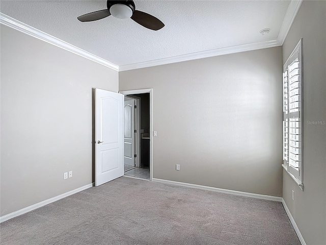 1513 Resolute St, Celebration, FL 34747 - carpeted empty room featuring ornamental molding, a ceiling fan, a textured ceiling, and a smoke detector