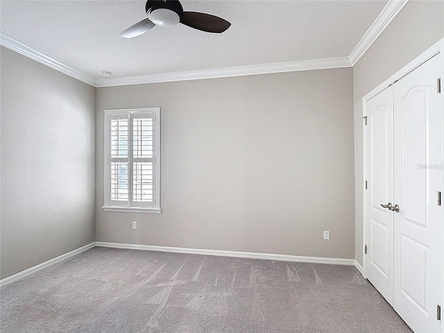1513 Resolute St, Celebration, FL 34747 - unfurnished bedroom with crown molding, carpet, a textured ceiling, a closet, and a ceiling fan