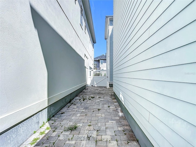 1513 Resolute St, Celebration, FL 34747 - view of property exterior with a patio area and a gate
